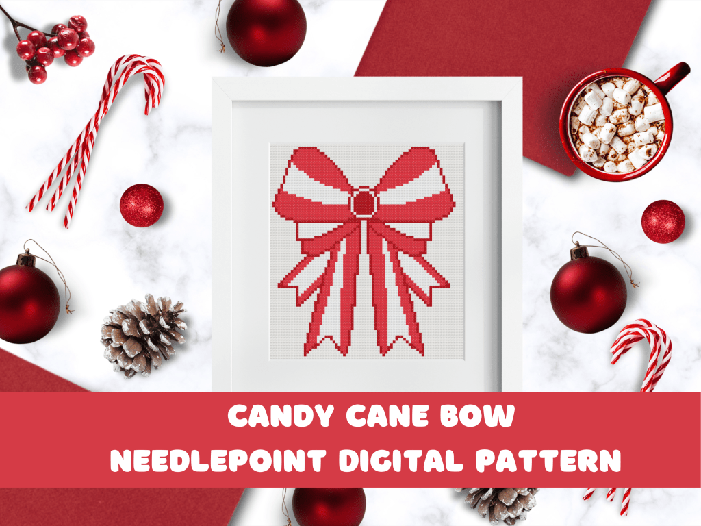candy cane bow cross stitch pattern in a white frame with ornaments and other holiday items around it. 